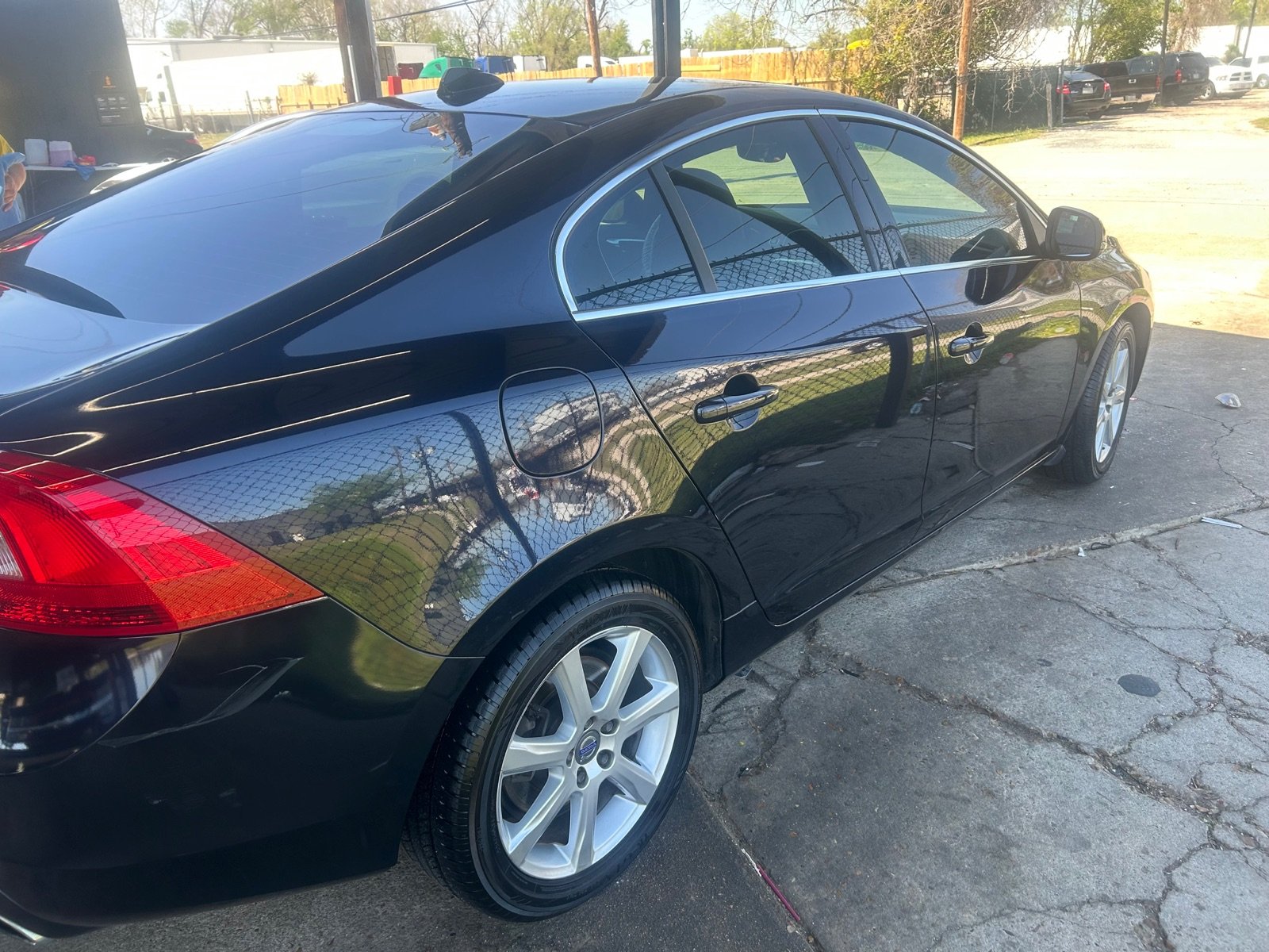 Glass-smooth freshly washed sedan at Pineapple Autospa, North Houston